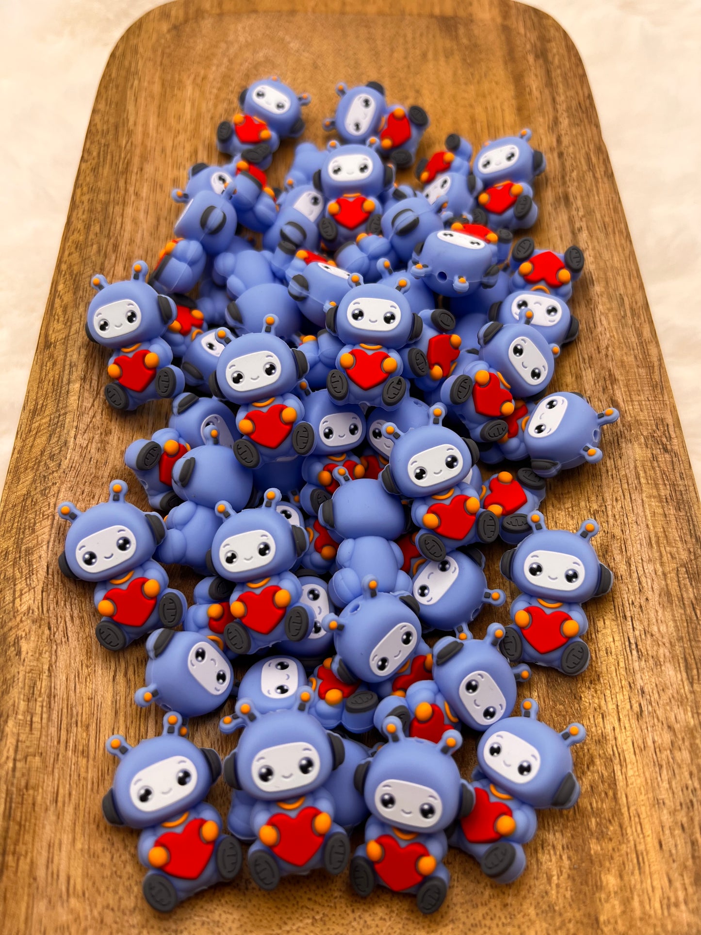 3D blue heart robot focal