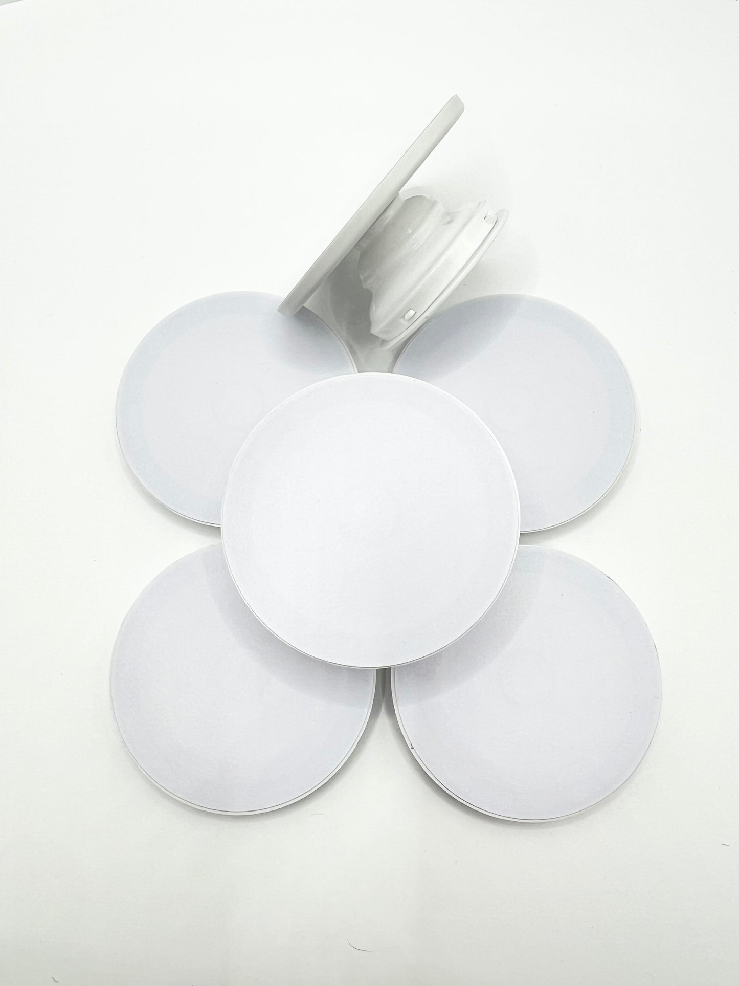MagSafe pop sockets (white circle)