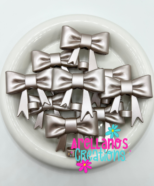 #94 pale rose gold large metallic bow straw topper