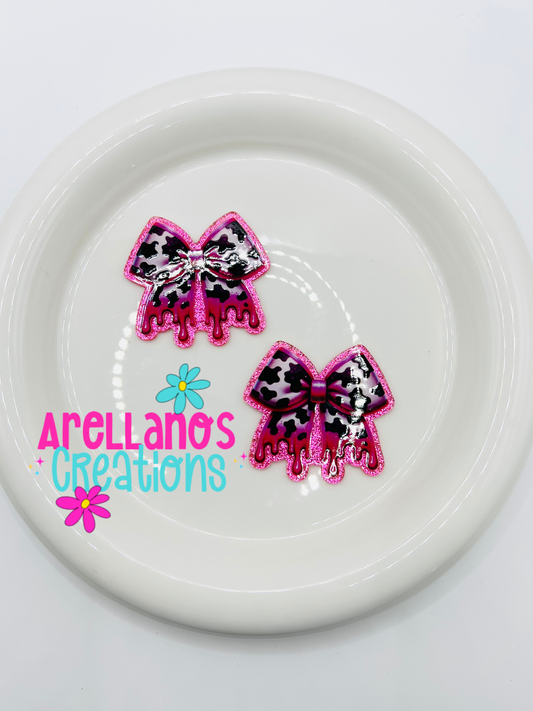 Pink cow print drip bow - acrylic flatback
