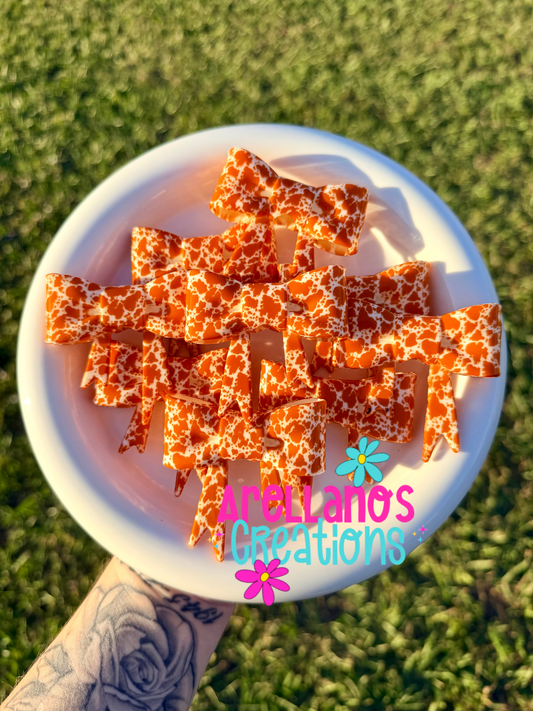 #147 orange cream cowhide shiny large bow FOCAL