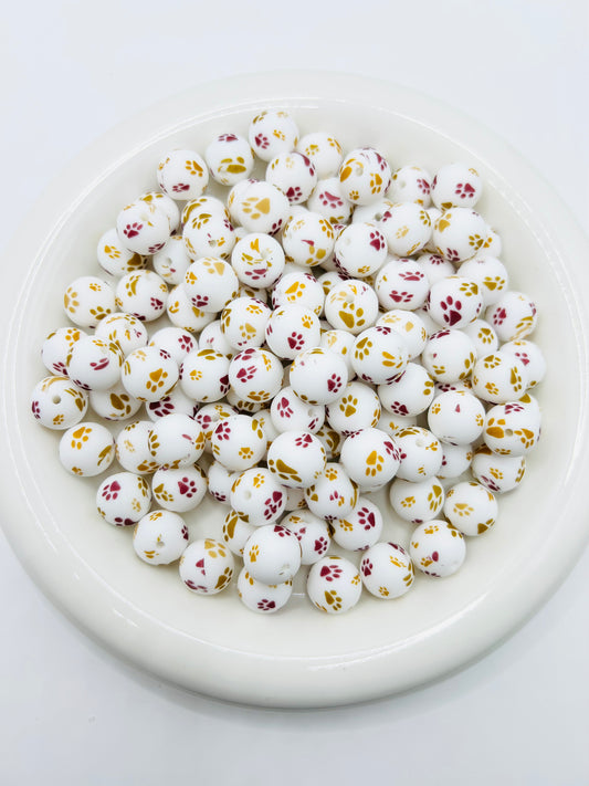15mm golden burgundy paw print silicone beads