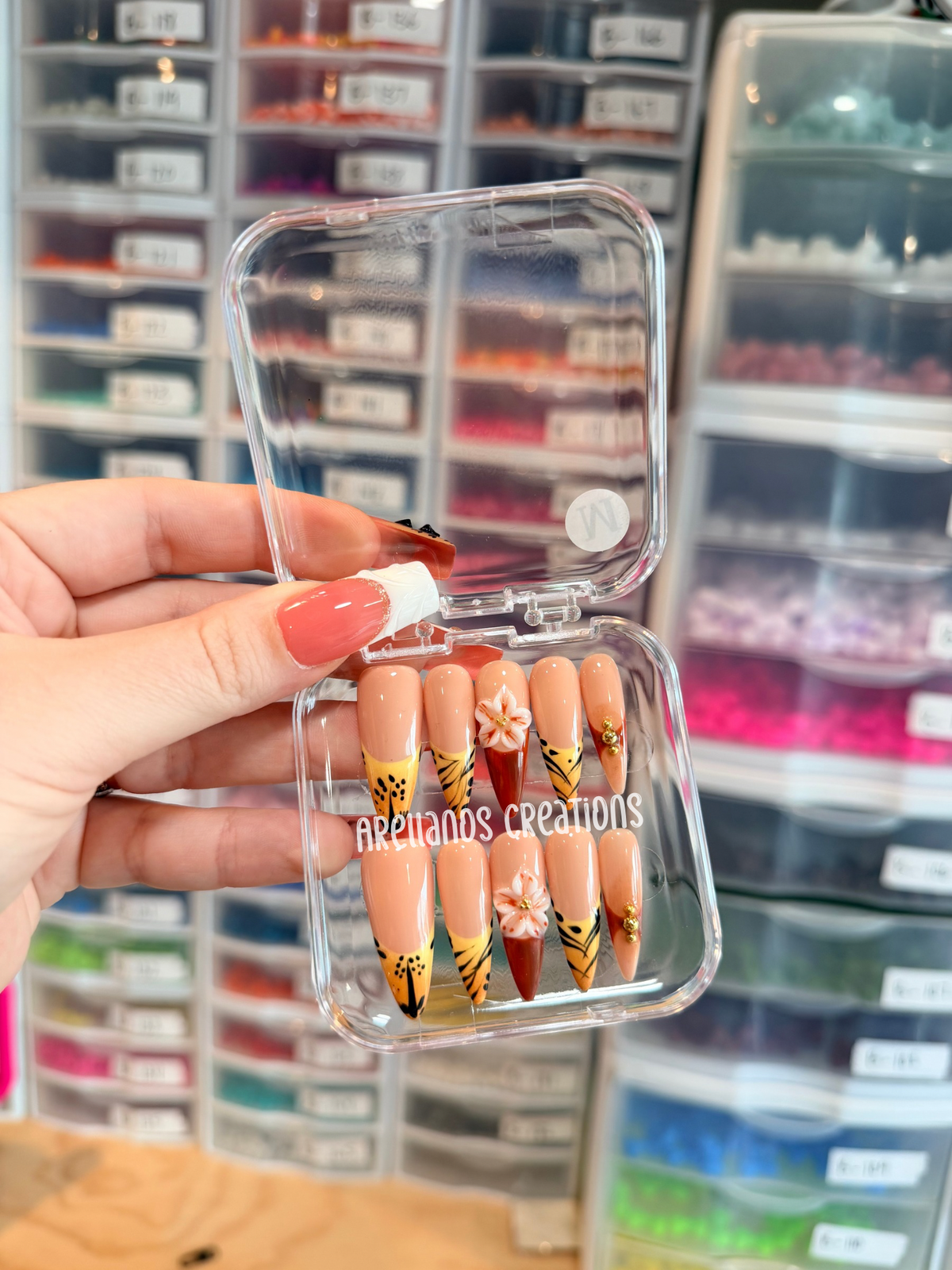 Yellow/burnt orange stiletto nails - medium size
