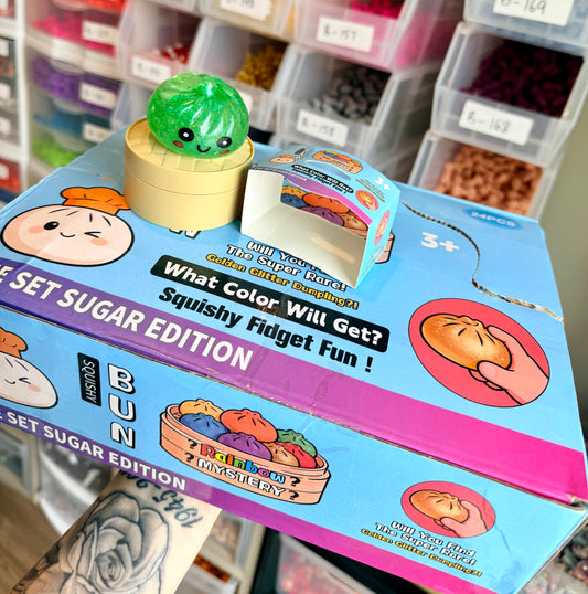 VIRAL MINI GLITTER DUMPLING SQUISHYS (1ct MYSTERY) MINI SIZE